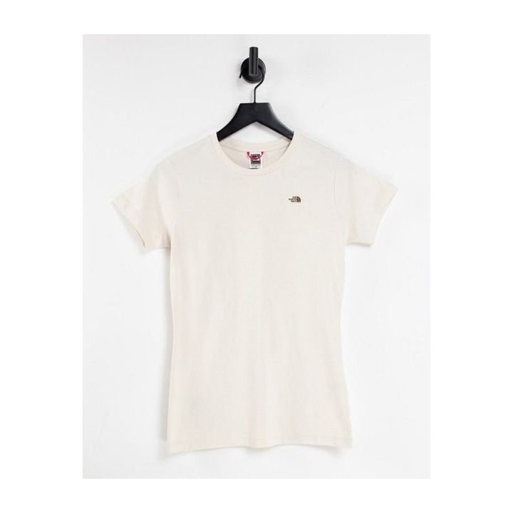 Ivory crewneck with a small discreet chest mark.