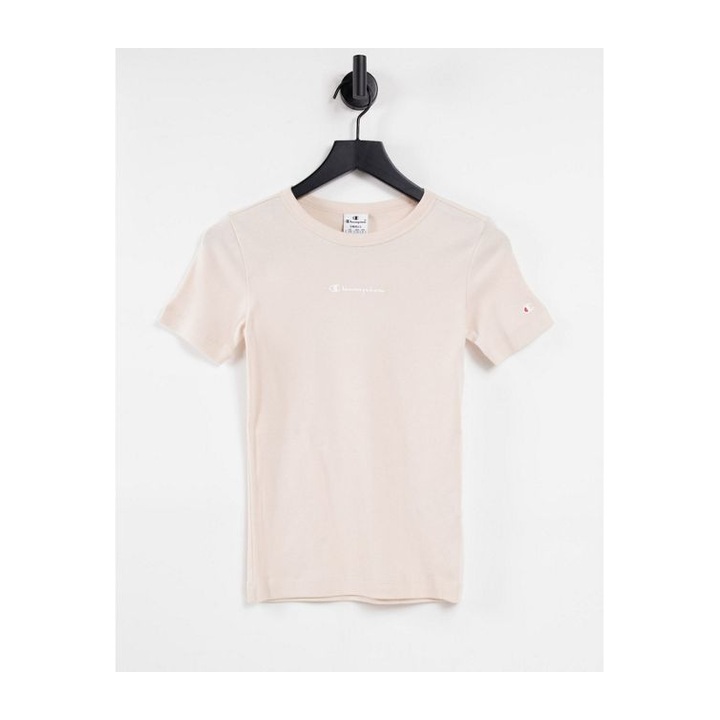 Blush short-sleeve crewneck with a small chest detail.